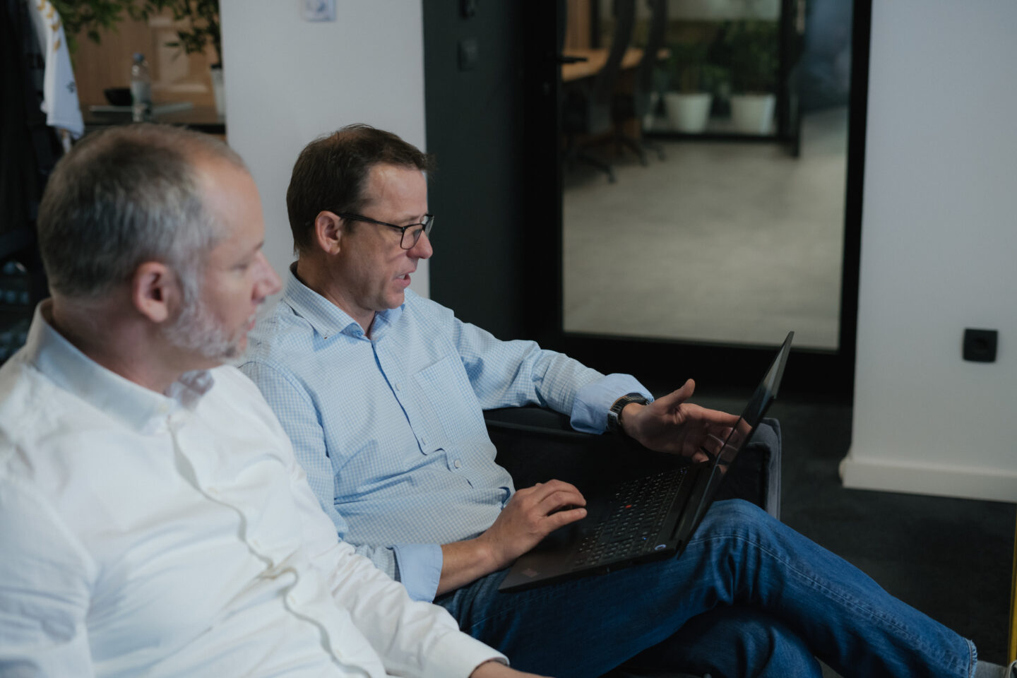 Coworkers sharing key takeaways